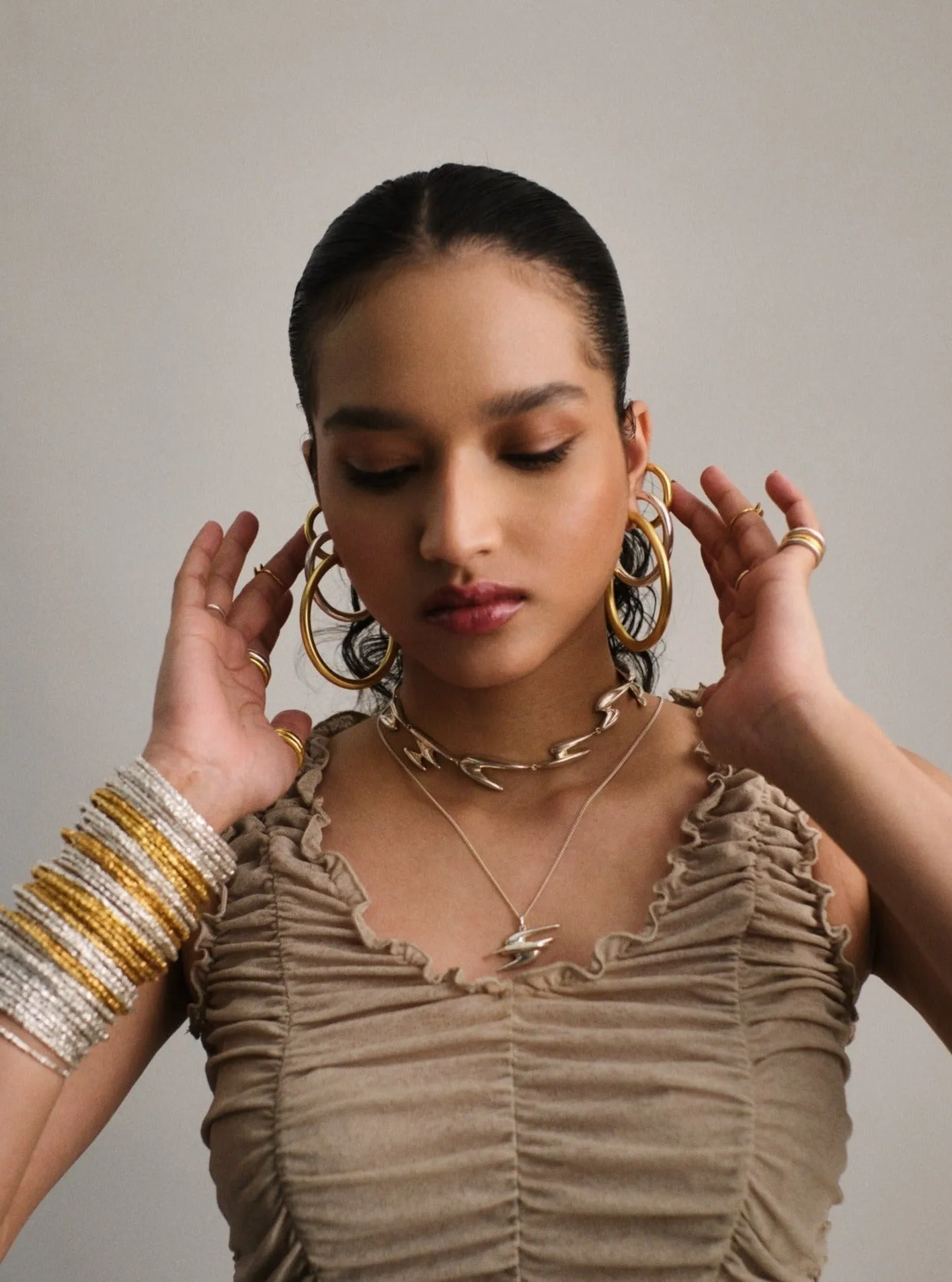 Big Narrow Chimbai Hoops in Silver Tone