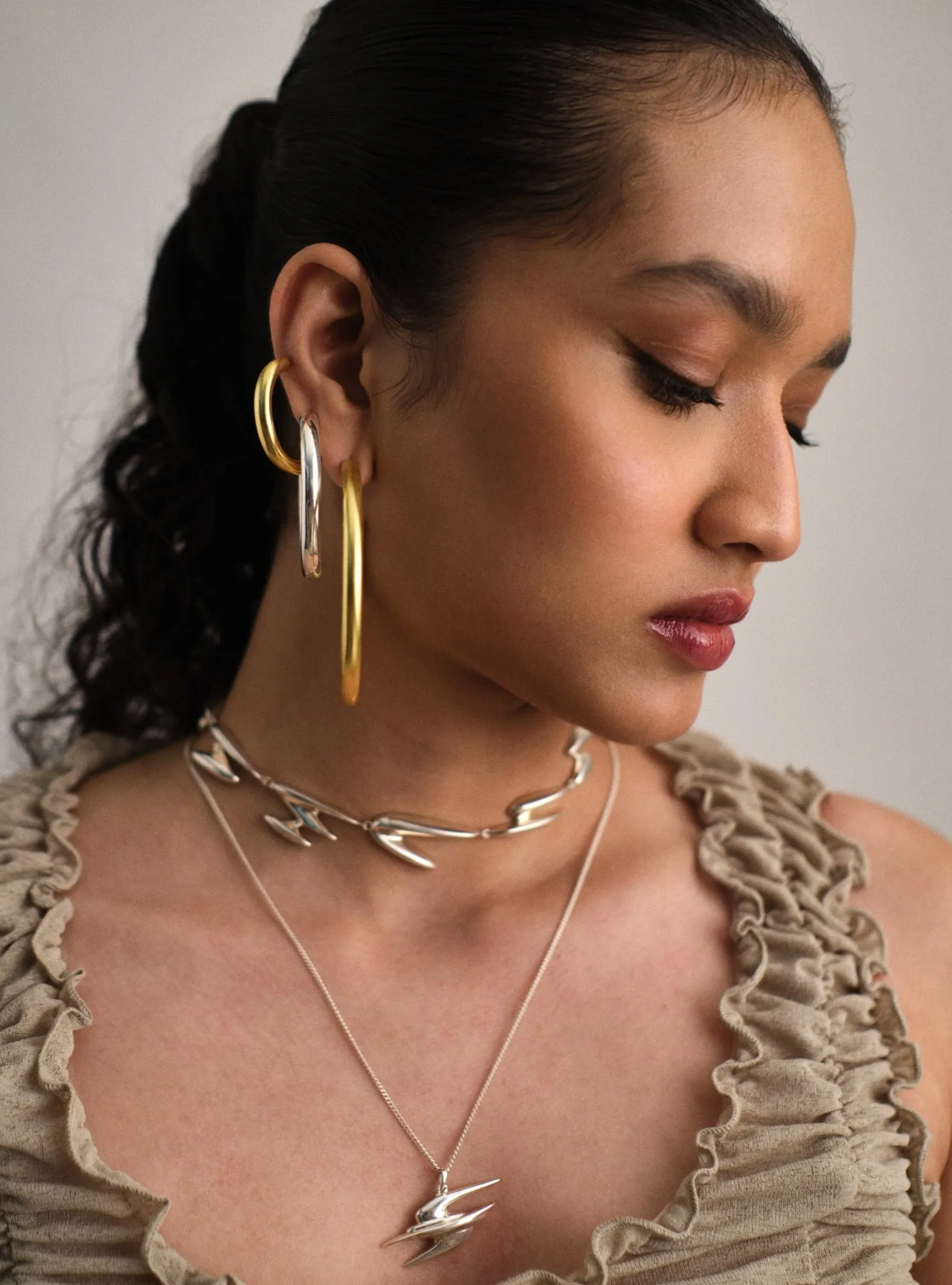 Big Narrow Chimbai Hoops in Silver Tone