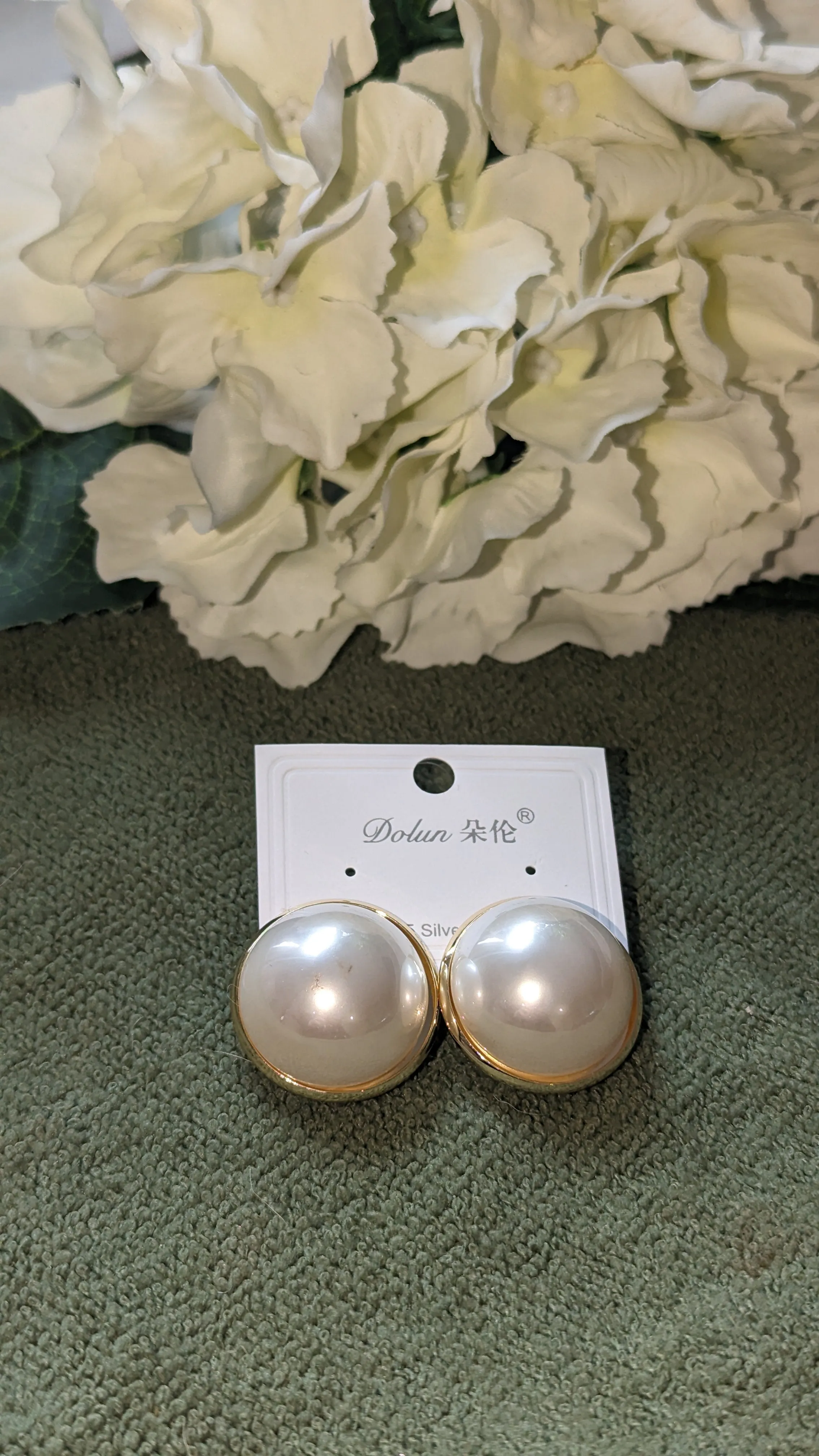 Large round pearl earrings