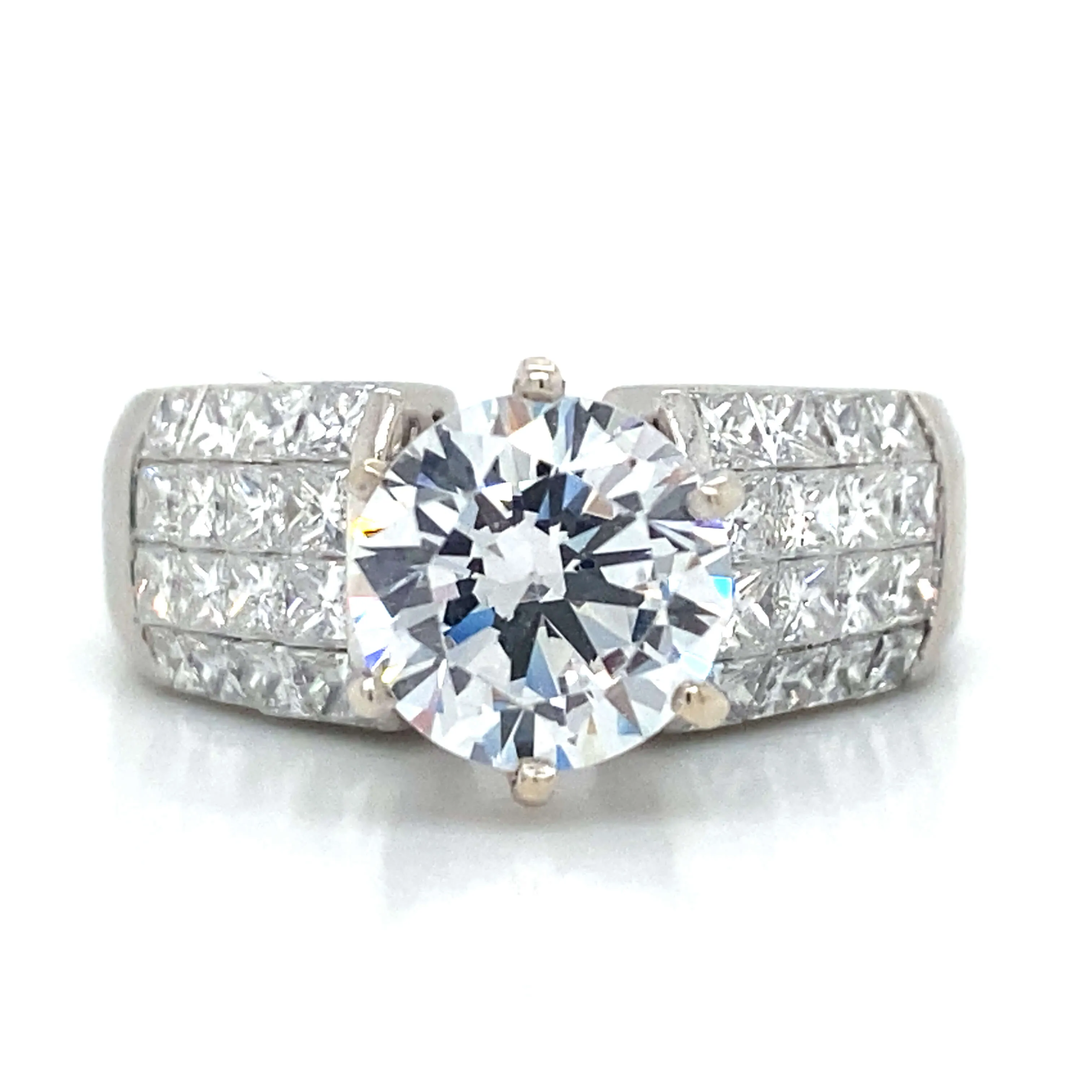 Side Stone Invisible Set Engagement Ring in Platinum