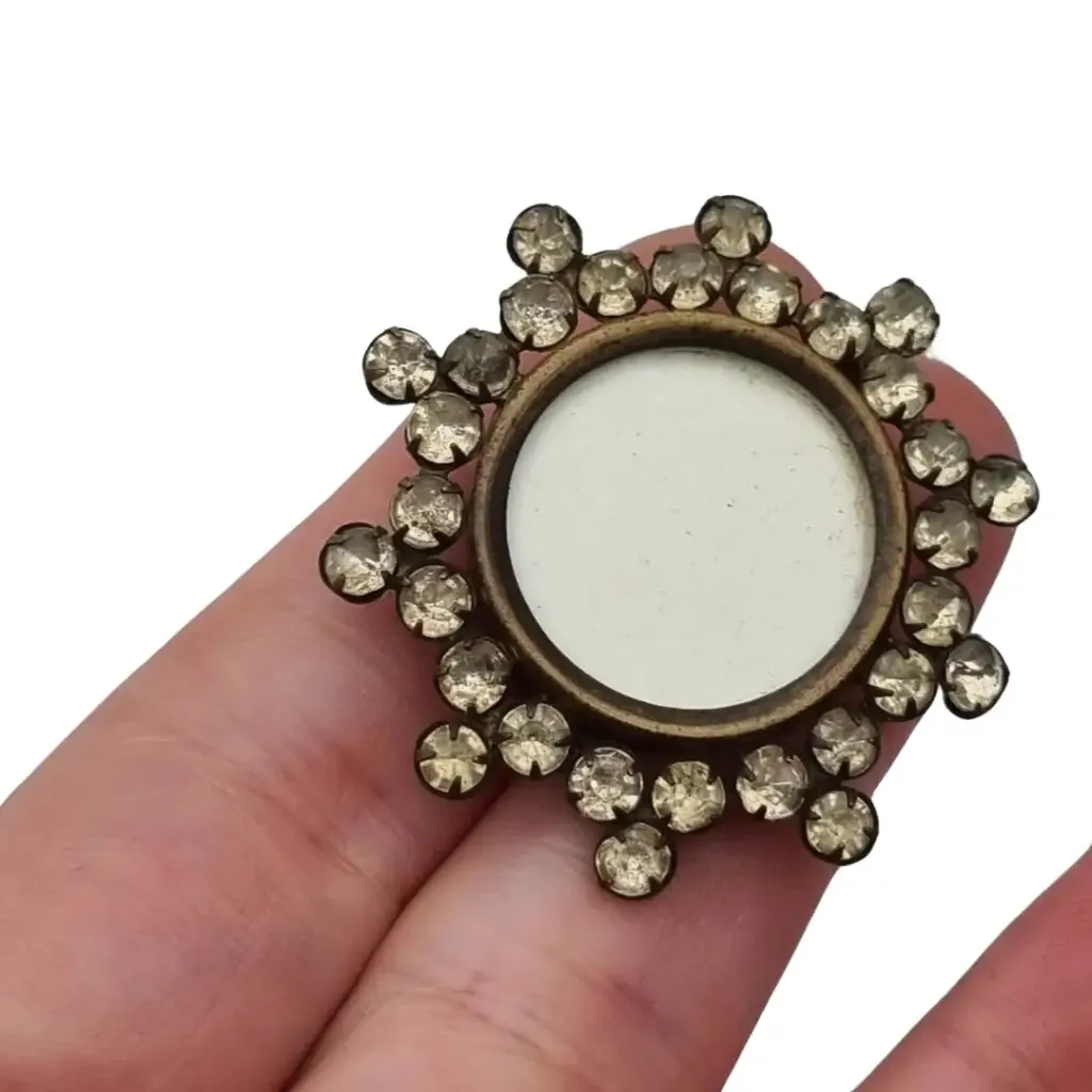 Vintage Victorian round locket brooch with white rhinestones, 1910.