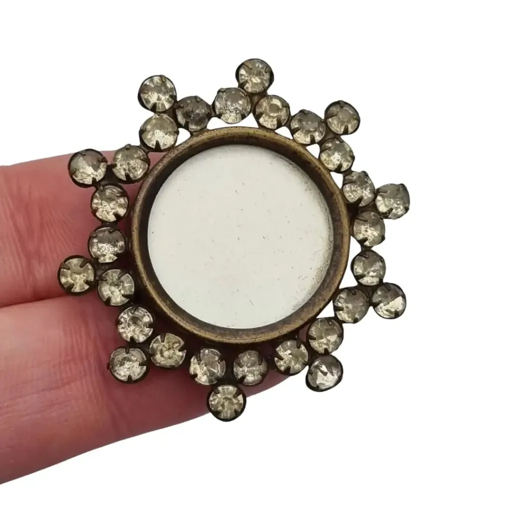 Vintage Victorian round locket brooch with white rhinestones, 1910.